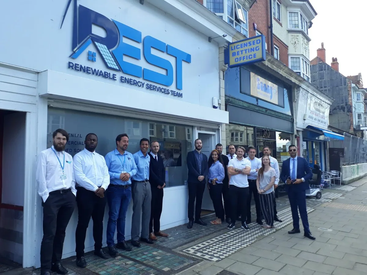 The REST UK team standing outside their shopfront