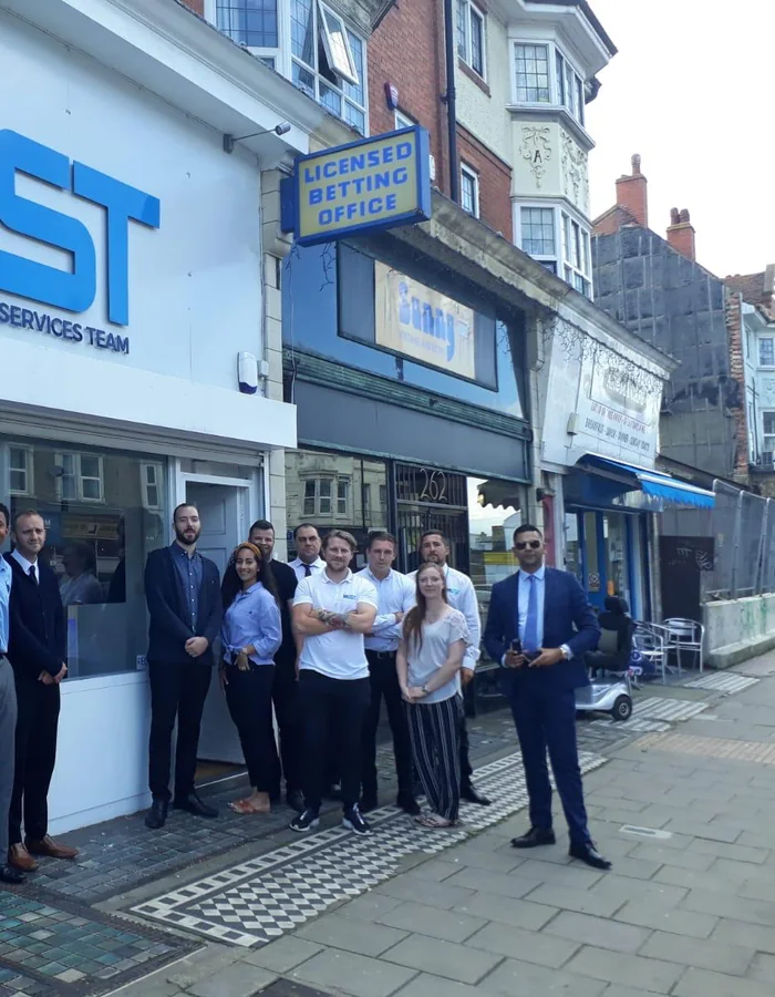 The REST UK team outside their shop